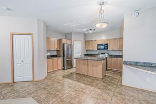 Photo 11: 104 151 Panatella Landing NW in Calgary: Panorama Hills Row/Townhouse for sale : MLS®# A2020288