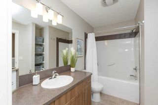 Photo 20: 705 101 Sunset Drive: Cochrane Row/Townhouse for sale : MLS®# A2106577