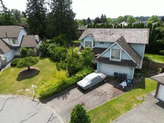 Photo 2: 8705 142A Street in Surrey: Bear Creek Green Timbers House for sale in "Brookside" : MLS®# R2784719