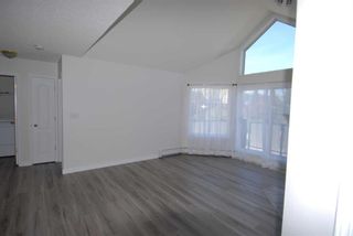 Photo 8: 407 20 Sierra Morena Mews SW in Calgary: Signal Hill Apartment for sale : MLS®# A2125393