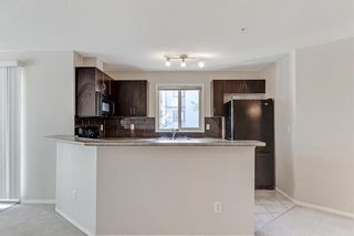 Photo 4: 2325 60 Panatella Street NW in Calgary: Panorama Hills Apartment for sale : MLS®# A1250628