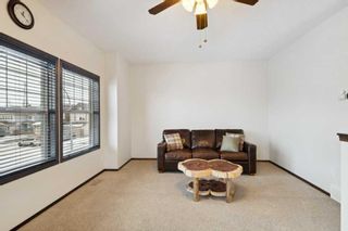 Photo 13: 306 Autumn Circle SE in Calgary: Auburn Bay Detached for sale : MLS®# A2097084