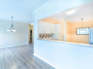 Photo 10: 404 15323 17A Avenue in Surrey: King George Corridor Condo for sale in "SEMIAMOO PLACE" (South Surrey White Rock)  : MLS®# R2822142