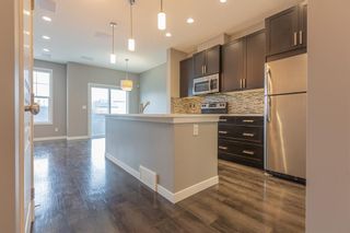 Photo 6: 107 881 Sage Valley Boulevard NW in Calgary: Sage Hill Row/Townhouse for sale : MLS®# A1242455