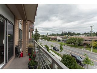 Photo 19: 301 5811 177B Street in Surrey: Cloverdale BC Condo for sale in "Latis" (Cloverdale)  : MLS®# R2084477