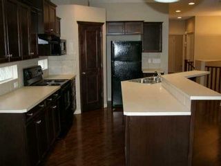 Photo 3:  in ST. JOHN'S: Auburn Bay Residential Detached Single Family for sale (Calgary)  : MLS®# C3233363