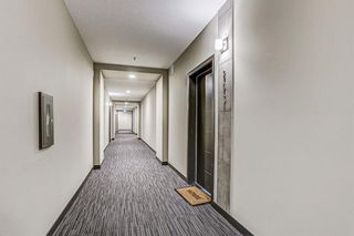 Photo 30: 205 8530 8A Avenue SW in Calgary: West Springs Apartment for sale : MLS®# A1080205
