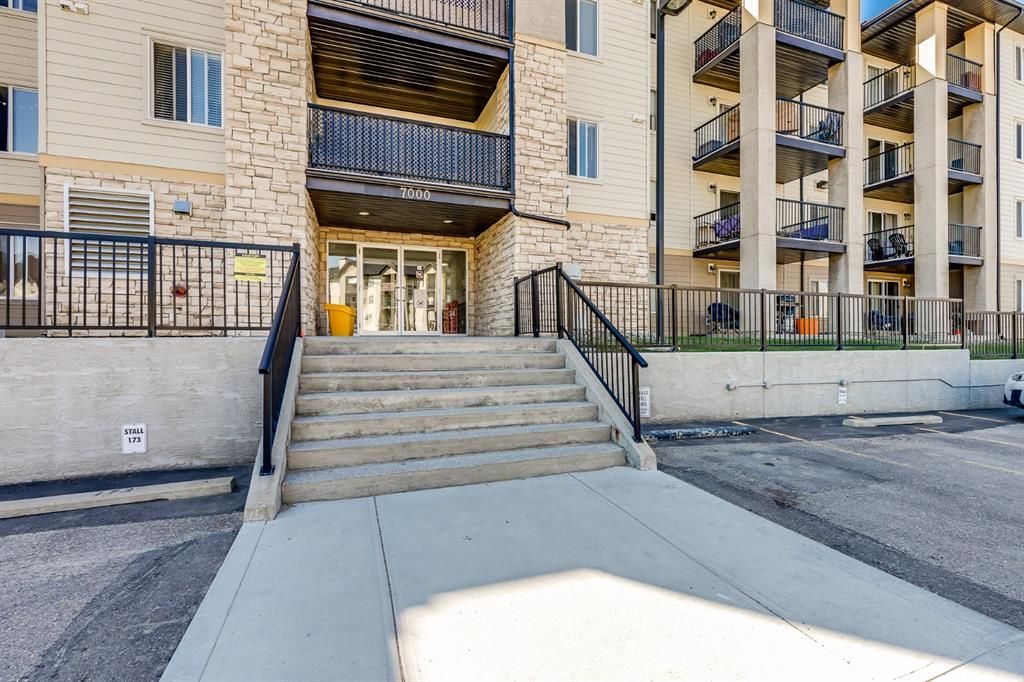 Main Photo: 7403 304 Mackenzie Way SW: Airdrie Apartment for sale : MLS®# A1251468