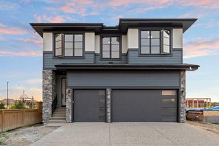 Photo 1: 68 Coulee Crescent SW in Calgary: Cougar Ridge Detached for sale : MLS®# A2071448