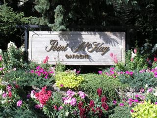 Photo 2: 332 Point Mckay Gardens NW in Calgary: Point McKay Row/Townhouse for sale : MLS®# A1227519