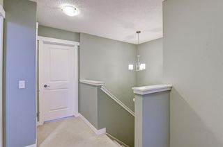 Photo 27: 179 Fireside Parkway: Cochrane Row/Townhouse for sale : MLS®# A1259498