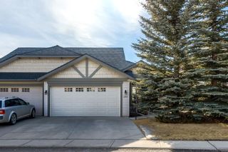 Photo 1: 205 Springbank Terrace SW in Calgary: Springbank Hill Semi Detached for sale : MLS®# A1182683