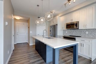 Photo 2: 310 100 Auburn Meadows Common SE in Calgary: Auburn Bay Apartment for sale : MLS®# A2002985