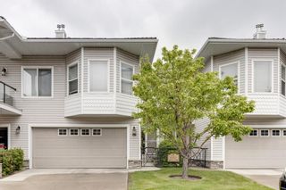 Photo 2: 129 Rocky Vista Terrace NW in Calgary: Rocky Ridge Row/Townhouse for sale : MLS®# A1230621