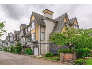 Photo 1: 63 16388 85 Avenue in Surrey: Fleetwood Tynehead Townhouse for sale in "CAMELOT" : MLS®# R2176238
