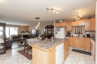 Photo 3: 409 4425 Heritage Way: Lacombe Apartment for sale : MLS®# A2032368