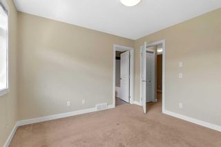Photo 18: 125 Panatella Road NW in Calgary: Panorama Hills Row/Townhouse for sale : MLS®# A2074246