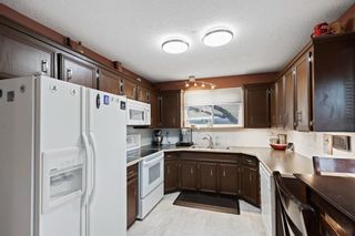 Photo 9: 49 Beaconsfield Crescent NW in Calgary: Beddington Heights Semi Detached for sale : MLS®# A1155424