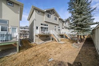 Photo 31: 76 Crystal Shores Cove: Okotoks Row/Townhouse for sale : MLS®# A1192998