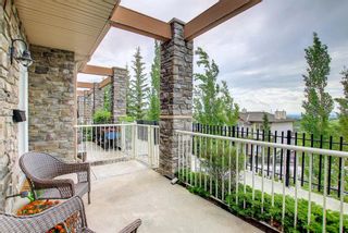 Photo 31: 1 108 Rockyledge View NW in Calgary: Rocky Ridge Row/Townhouse for sale : MLS®# A1234759