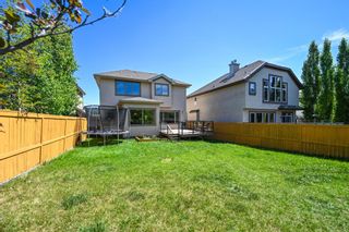 Photo 1: 9A Tusslewood Drive NW in Calgary: Tuscany Detached for sale : MLS®# A1115918