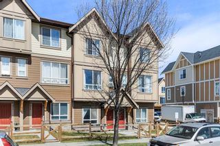 Photo 1: 978 Sherwood Boulevard NW in Calgary: Sherwood Row/Townhouse for sale : MLS®# A2128307