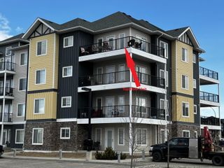 Photo 1: 411 11203 105 Avenue in Fort St. John: Fort St. John - City NW Condo for sale in "SIGNATURE POINTE" : MLS®# R2768106