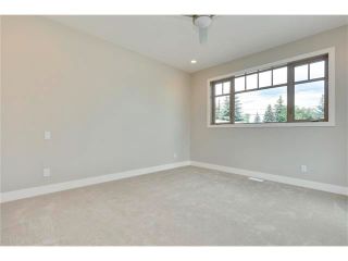 Photo 18: 5628 LODGE Crescent SW in Calgary: Lakeview House for sale : MLS®# C4070560