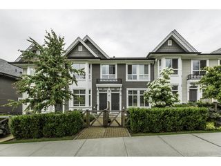 Photo 1: 11 14433 60 Avenue in Surrey: Sullivan Station Townhouse for sale in "BRIXTON" : MLS®# R2179960