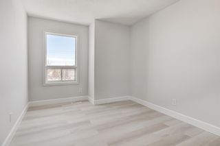Photo 16: 203 Signal Hill Green SW in Calgary: Signal Hill Row/Townhouse for sale : MLS®# A1070915