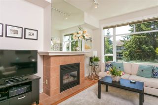 Photo 1: 307 3600 WINDCREST Drive in North Vancouver: Roche Point Condo for sale in "WINDSONG AT RAVENWOODS" : MLS®# R2381678