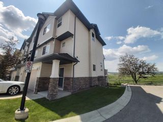 Photo 1: 175 Hidden Creek Cove NW in Calgary: Hidden Valley Row/Townhouse for sale : MLS®# A1250656