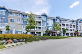 Photo 3: 212 16396 64 Avenue in Surrey: Cloverdale BC Condo for sale in "The Ridge" (Cloverdale)  : MLS®# R2469106