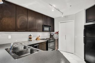 Photo 2: 118 35 Richard Court SW in Calgary: Lincoln Park Apartment for sale : MLS®# A2033945