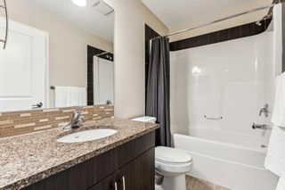 Photo 12: 2407 15 Sunset Square: Cochrane Apartment for sale : MLS®# A2112968