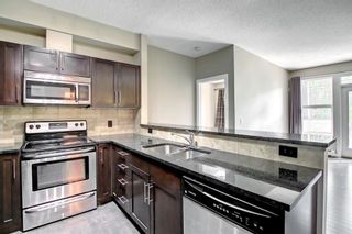 Photo 7: 209 76 Panatella Road NW in Calgary: Panorama Hills Apartment for sale : MLS®# A1244884