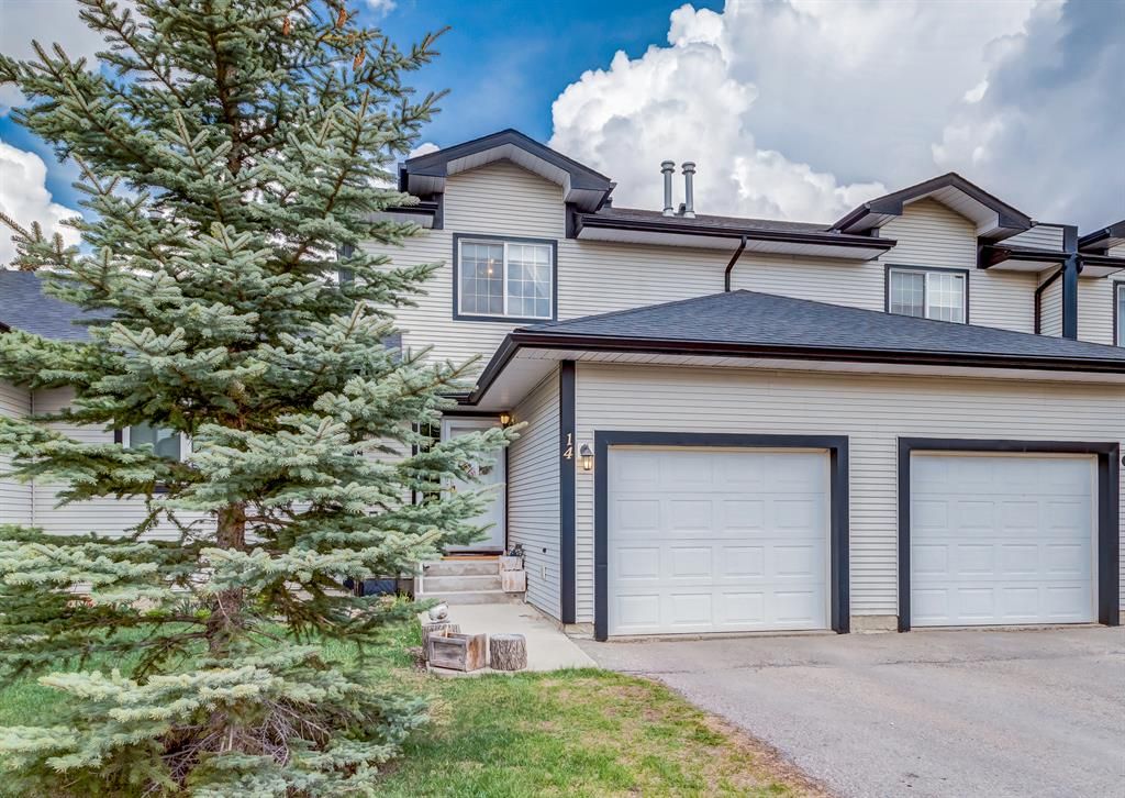 Main Photo: 14 12 Silver Creek Boulevard NW: Airdrie Row/Townhouse for sale : MLS®# A2067657