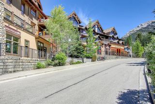 Photo 1: 406 701 Benchlands Trail: Canmore Apartment for sale : MLS®# A1241976