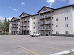 Main Photo: 203 5205 Woodland Road: Innisfail Apartment for sale : MLS®# A1195720