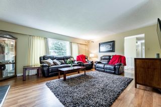 Photo 7: 12964 GLENGARRY Crescent in Surrey: Queen Mary Park Surrey House for sale : MLS®# R2715977
