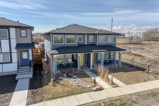 Photo 33: 37 River Heights Drive: Cochrane Semi Detached (Half Duplex) for sale : MLS®# A2130528