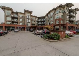 Photo 1: 205 33539 HOLLAND Avenue in Abbotsford: Central Abbotsford Condo for sale in "THE CROSSING" : MLS®# R2274996