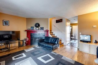 Photo 7: 128 7172 COACH HILL Road SW in Calgary: Coach Hill Row/Townhouse for sale : MLS®# A1216210