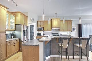 Photo 6: 31 Strathlea Common SW in Calgary: Strathcona Park Detached for sale : MLS®# A1147556