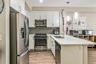 Photo 5: 111 150 Auburn Meadows Manor SE in Calgary: Auburn Bay Apartment for sale : MLS®# A1254330