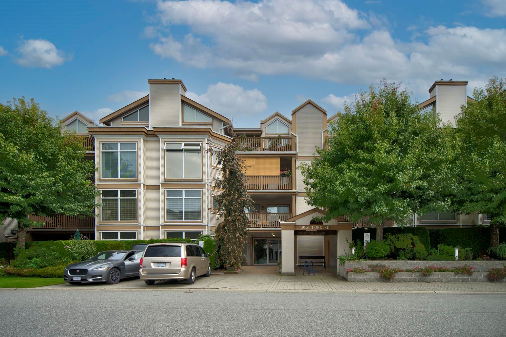 Main Photo: 206 19131 FORD Road in Pitt Meadows: Central Meadows Condo for sale in "WOODFORD MANOR" : MLS®# R2620099