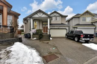 Photo 2: 8085 135A Street in Surrey: Queen Mary Park Surrey House for sale in "WEST NEWTON" : MLS®# R2642393