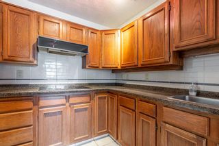 Photo 15: 10 Woodmeadow Close SW in Calgary: Woodlands Semi Detached for sale : MLS®# A1242856