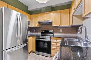 Photo 8: 319 8 Prestwick Pond Terrace SE in Calgary: McKenzie Towne Apartment for sale : MLS®# A2143732