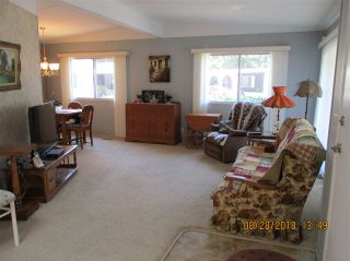 Photo 2: 57 2305 200 Street in Langley: Brookswood Langley Manufactured Home for sale in "CEDAR LANE" : MLS®# R2357125